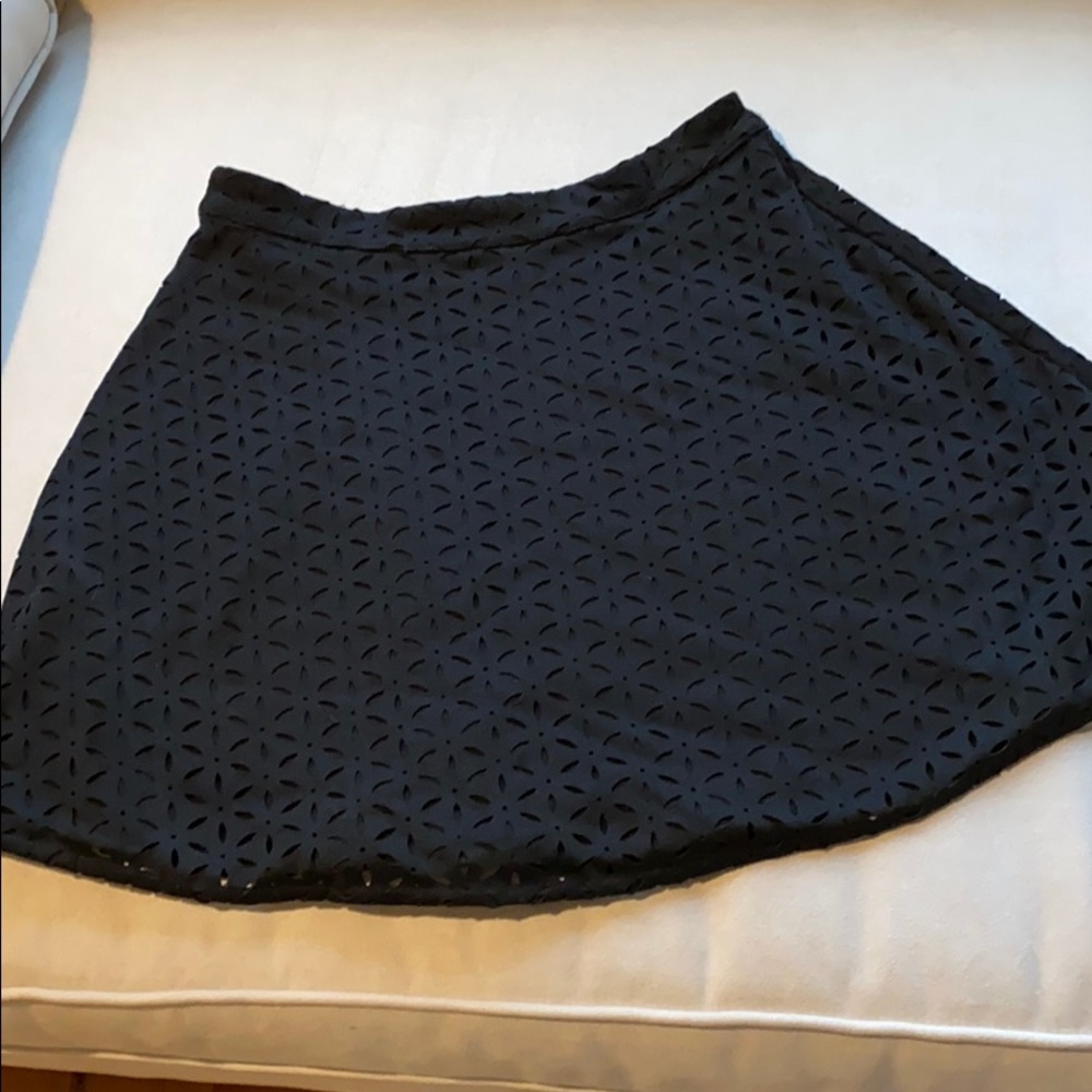 Black laser cut mini skirt